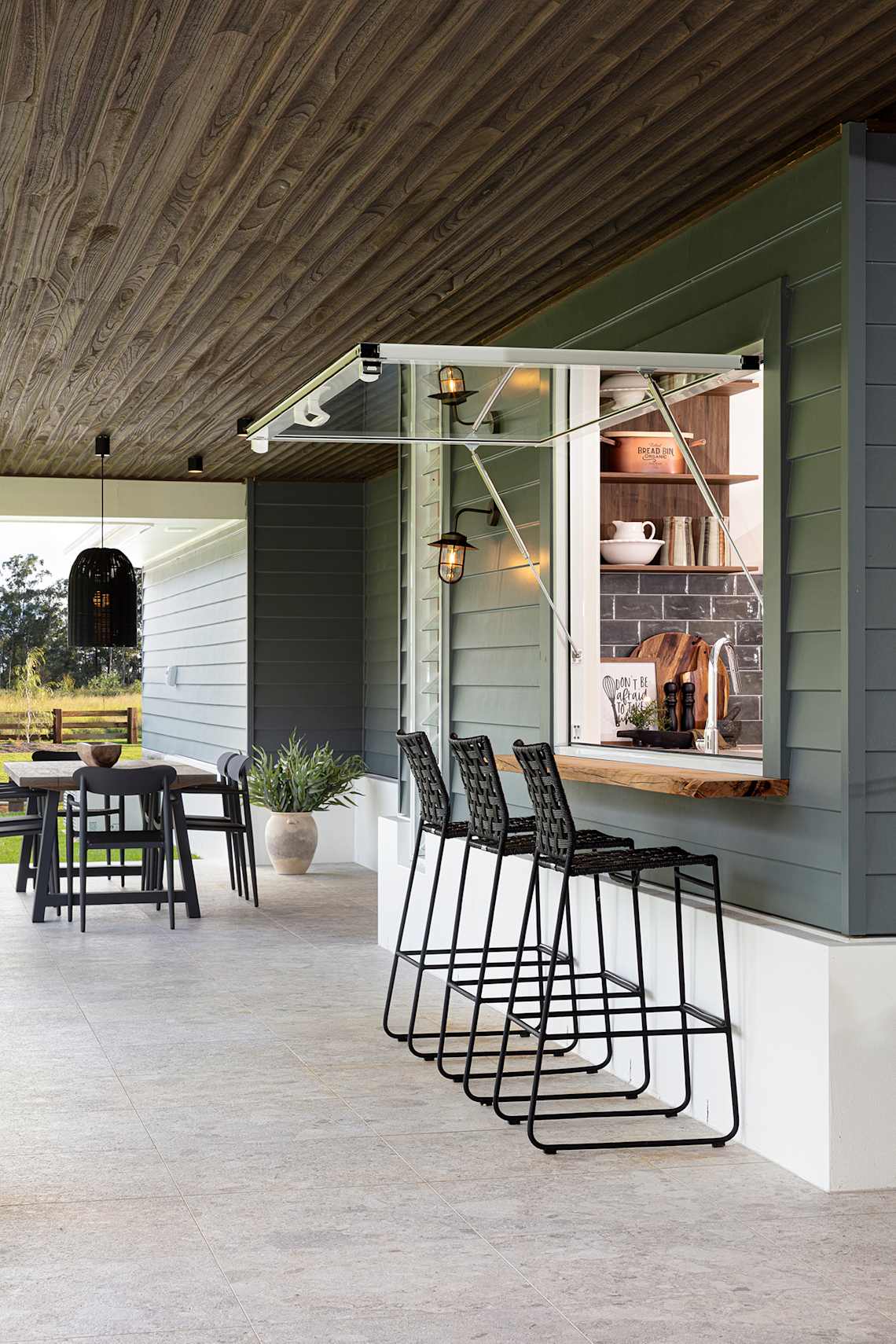 Hunter Acreage Home Design by Brighton with Breakfast Bar and Serving Window.