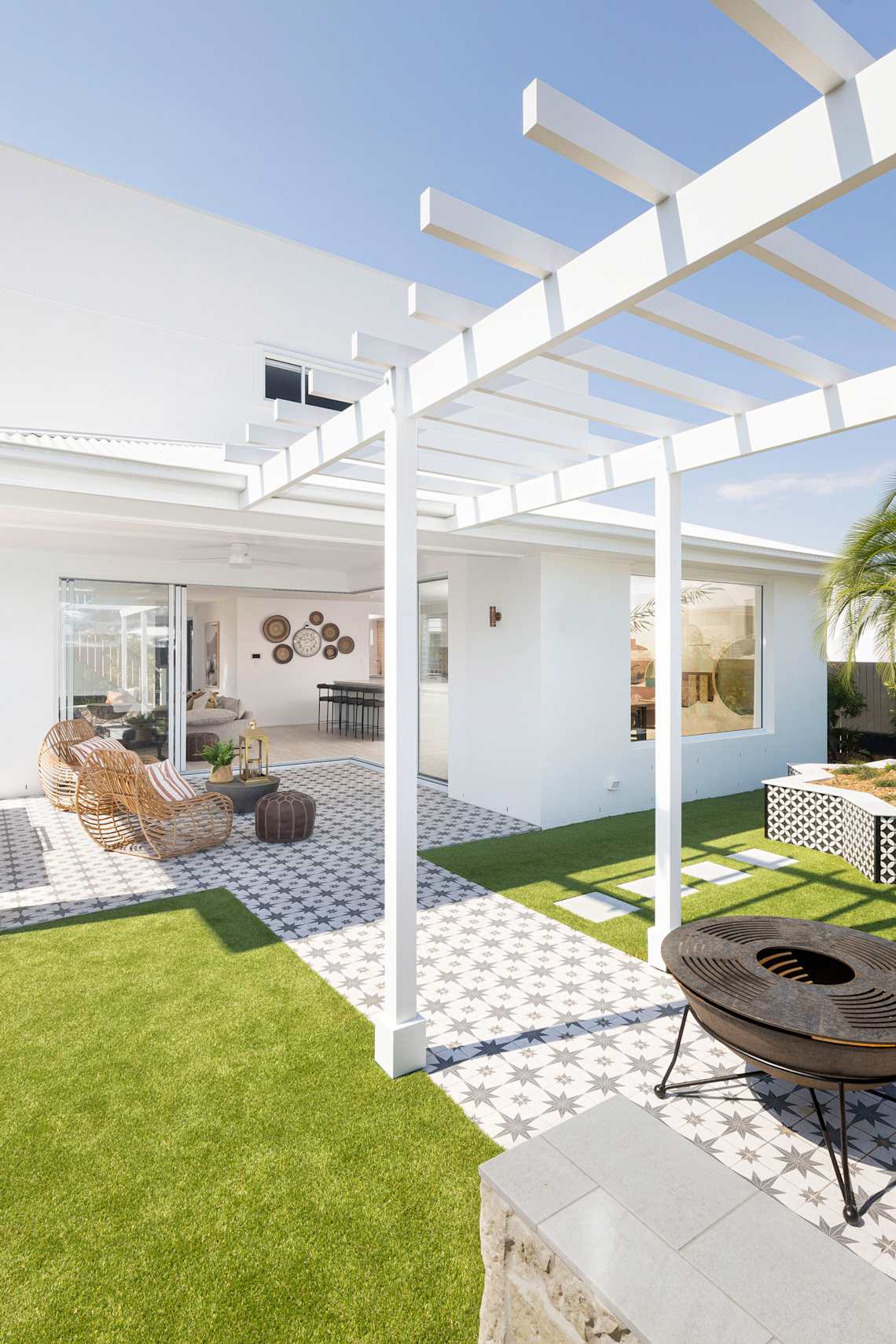 Monterey 37 home design outdoor living. Global design style. Corner block house design.