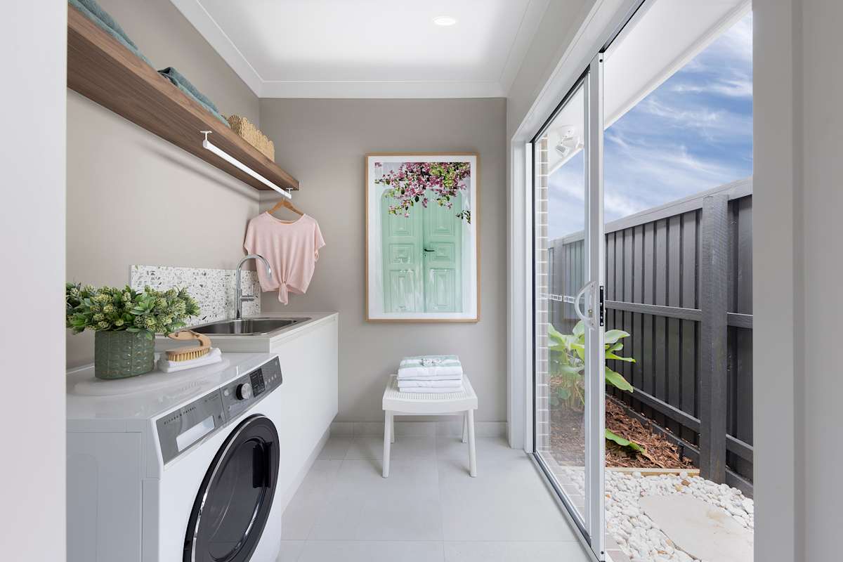 image upload c_limit,f_auto,w_1200 v1774418420 home-designs meridian displays meridian-24-aura meridian-24-home-design-aura-display_laundry